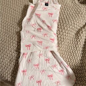 Kyte Baby pink bow swaddle sleep bag